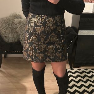Black and gold Bebe mini skirt